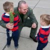 This pilot's children welcomed him home Saturday.